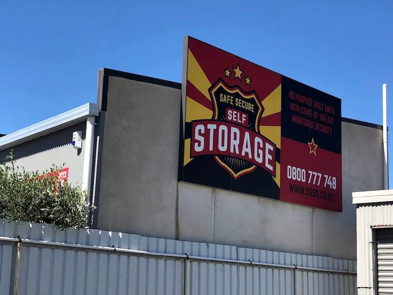 The Safe Secure Self Storage sign on the building
